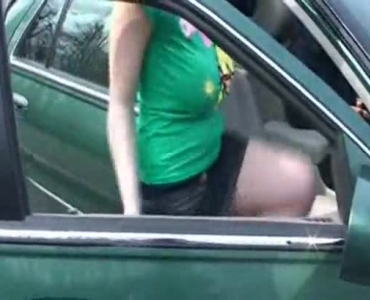 Naked Chick Is Playing With Her Huge Boobs In The Back Of A Van, With Horny Guys
